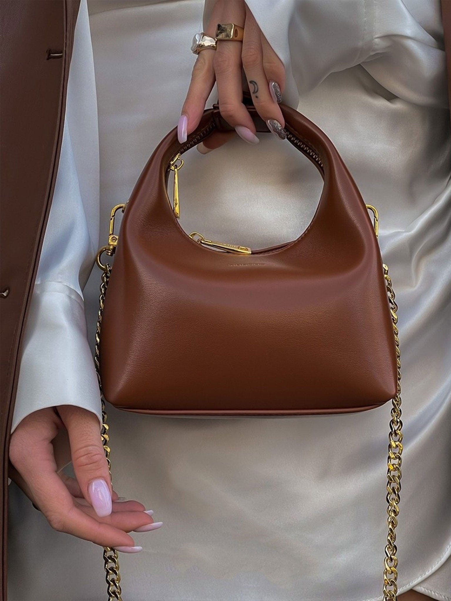 Vienna Top Handle Crossbody Bag - Brown-Model Holding Front View