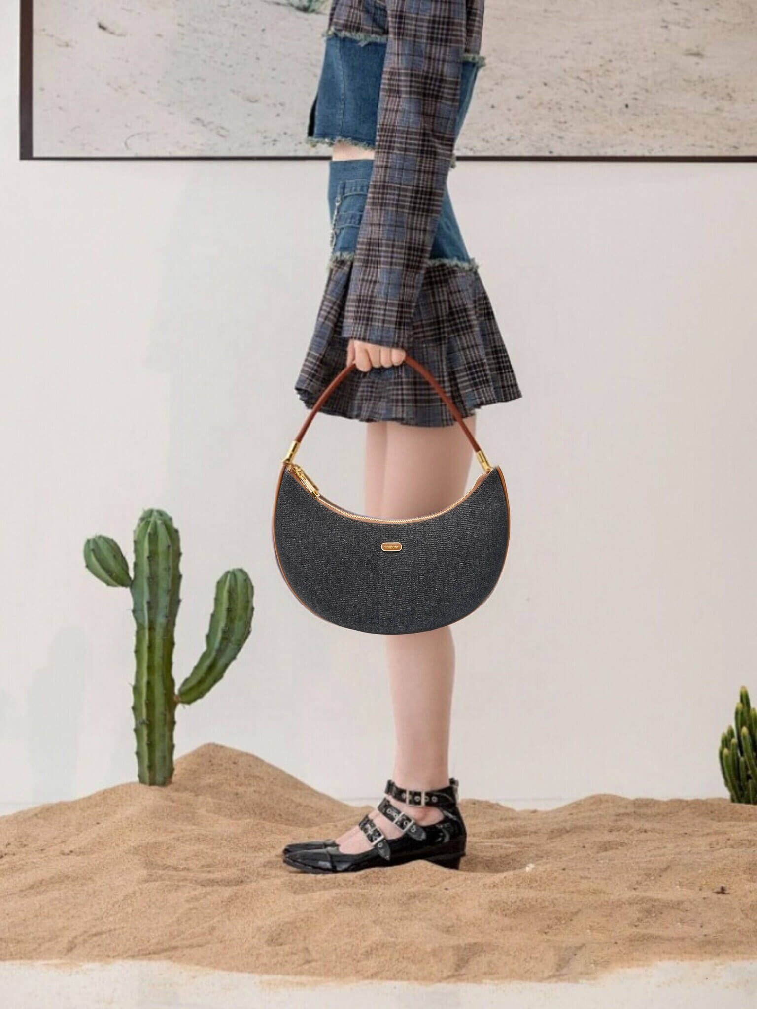 Zoey Shoulder Crossbody Bag in Black&Brown Denim texture Leather - Model Holding Front View