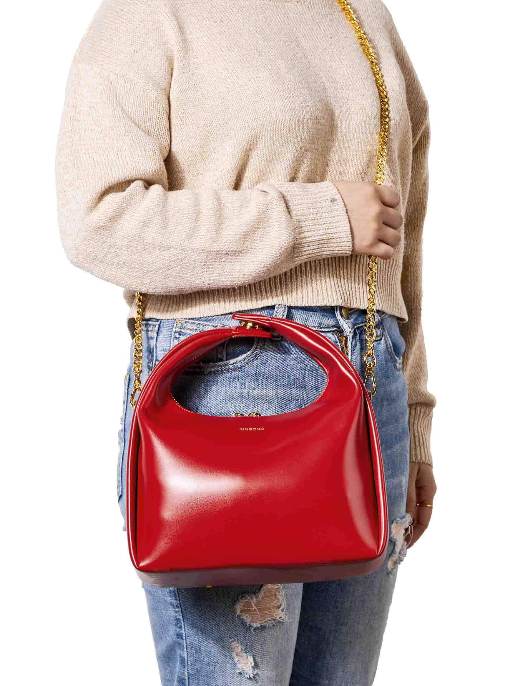 Medium Vienna Top Handle  Crossbody Bag in Red Vegan Leather - Model Wearing on Shoulder