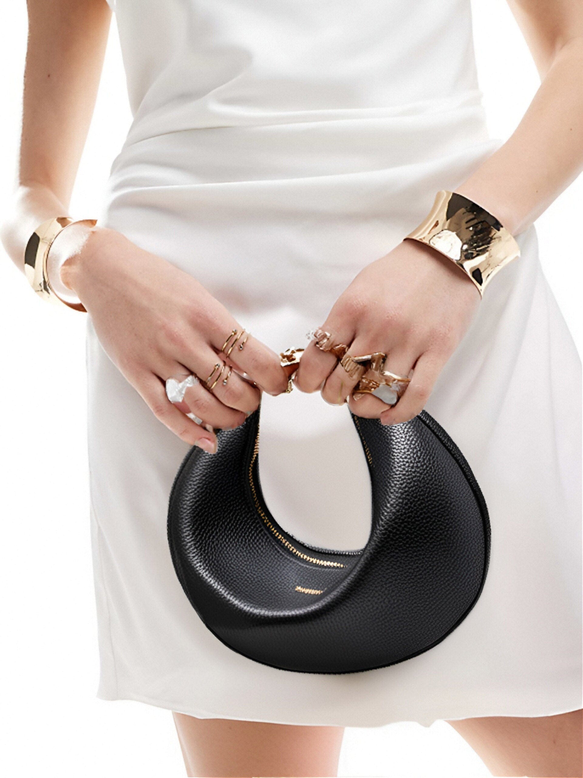 Zoey Shoulder Crossbody Bag in Black Vegan Leather - Model Holding Front View
