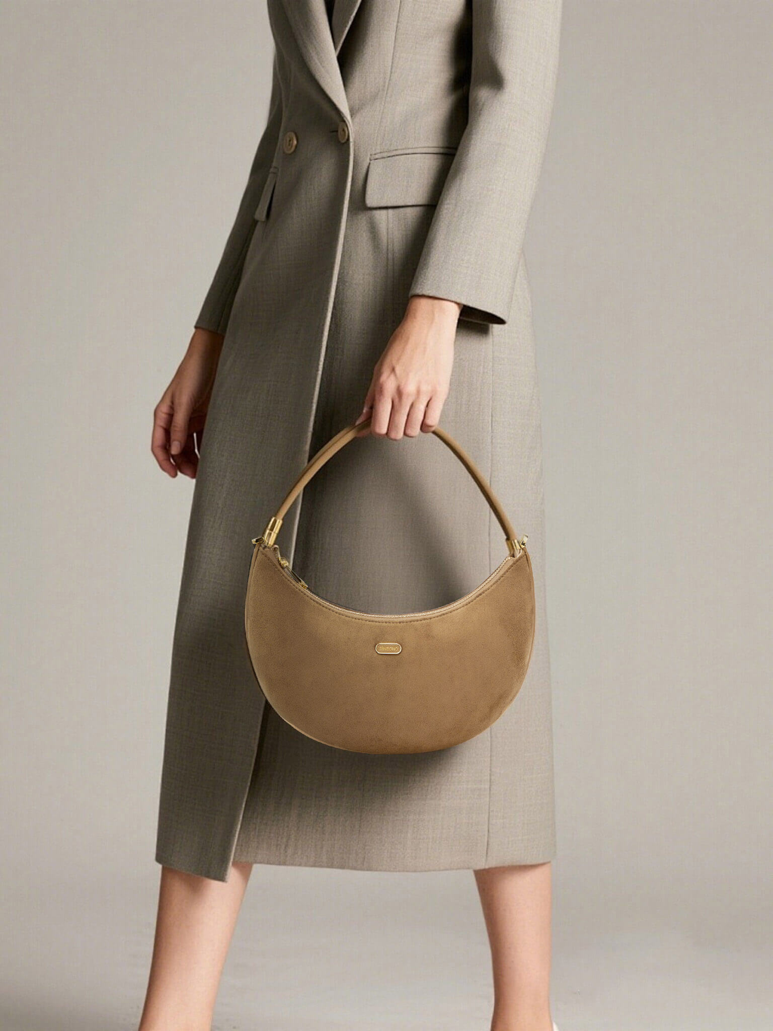 Zoey Shoulder Crossbody Bag  in Brown Fake Suede Denim texture Leather - Model Holding Front View